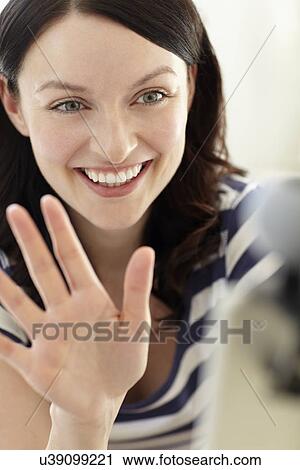 Woman using skype View Large Photo Image Stock Image - Woman using skype. Fotosearch