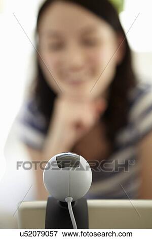 Stock Photo - Woman using skype. Fotosearch
