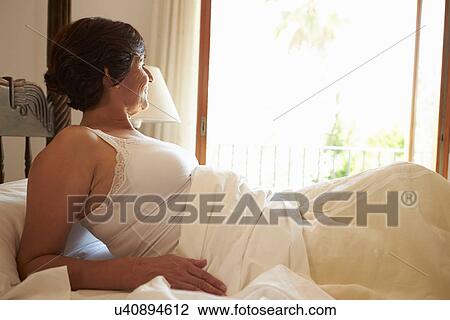 Woman Waking Up In Bed In Morning View Large Photo Image Stock Image - Woman Waking Up In Bed In Morning. Fotosearch