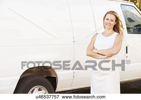 Woman Wearing Apron Standing In Front Of Van View Large Photo Image Stock Photo - Woman Wearing Apron Standing In Front Of Van. Fotosearch
