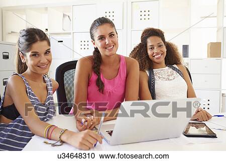 Women Using Laptop In Modern Office Of Start Up Business View Large Photo Image Stock Image - Women Using Laptop In Modern Office Of Start Up Business. Fotosearch