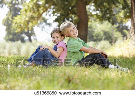 Young brother and sister in the country View Large Photo Image Stock Image - Young brother and sister in the country. Fotosearch