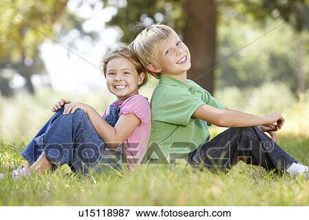 Young brother and sister in the country View Large Photo Image Stock Photo - Young brother and sister in the country. Fotosearch