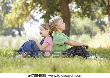 Stock Photo - Young brother and sister in the country. Fotosearch