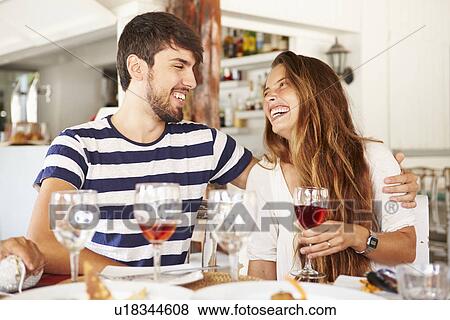 Young Couple Enjoying Meal In Outdoor Restaurant View Large Photo Image Stock Photo - Young Couple Enjoying Meal In Outdoor Restaurant. Fotosearch