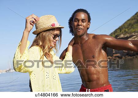 Young Couple Having Fun In Sea Together View Large Photo Image Stock Photograph - Young Couple Having Fun In Sea Together. Fotosearch