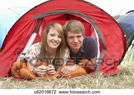 Young couple on camping trip View Large Photo Image Stock Image - Young couple on camping trip. Fotosearch