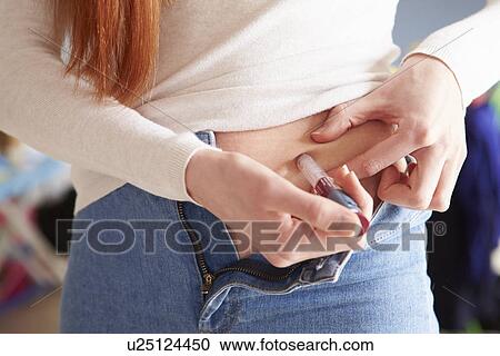 Young Couple Sitting On Sofa Using Digital Tablet View Large Photo Image Stock Image - Young Couple Sitting On Sofa Using Digital Tablet. Fotosearch