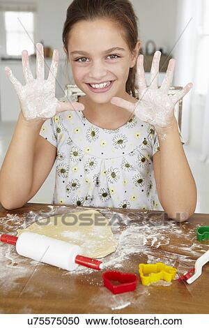 Young girl baking View Large Photo Image Stock Image - Young girl baking. Fotosearch
