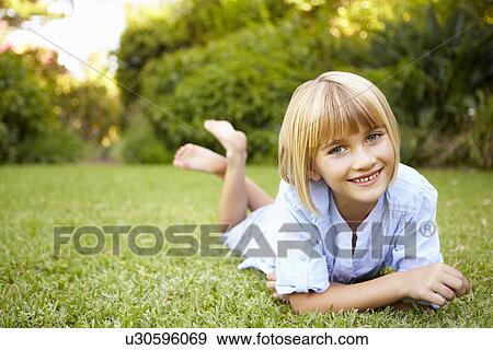 Young girl outdoors View Large Photo Image Stock Photo - Young girl outdoors. Fotosearch