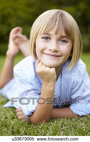 Young girl outdoors View Large Photo Image Stock Photography - Young girl outdoors. Fotosearch