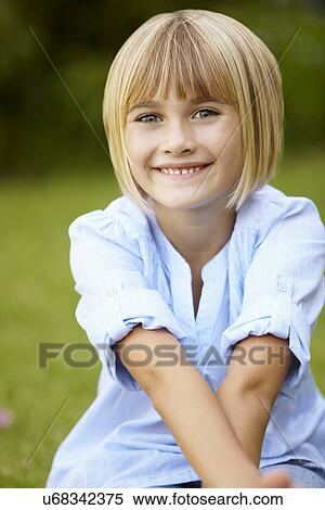 Stock Photography - Young girl outdoors. Fotosearch