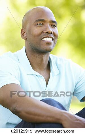 Young man portrait outdoors View Large Photo Image Stock Photography - Young man portrait outdoors. Fotosearch