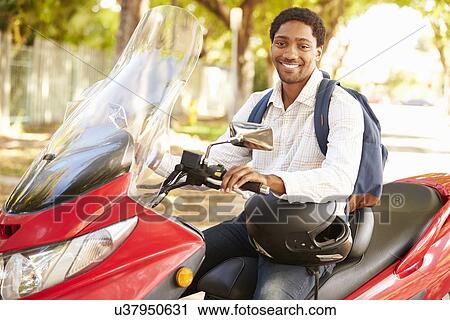Young Man Riding Motor Scooter To Work View Large Photo Image Stock Image - Young Man Riding Motor Scooter To Work. Fotosearch