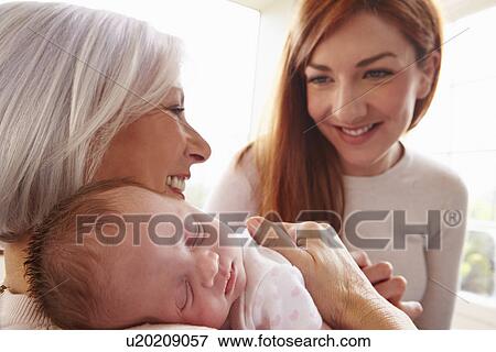 Young Man With Dog Sit On Sofa Using Digital Tablet View Large Photo Image Stock Photo - Young Man With Dog Sit On Sofa Using Digital Tablet. Fotosearch