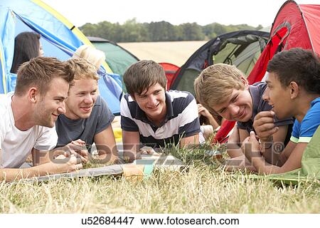 Young people on camping trip View Large Photo Image Stock Photo - Young people on camping trip. Fotosearch