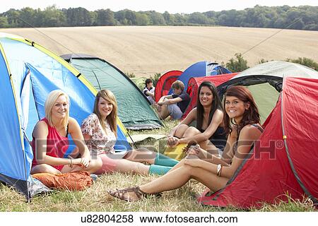 Stock Photo - Young people on camping trip. Fotosearch
