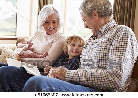 Young Woman Using Digital Tablet At Home View Large Photo Image Stock Photo - Young Woman Using Digital Tablet At Home. Fotosearch