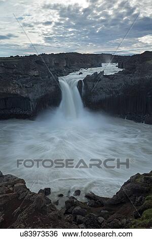 Stock Photograph - Aldeyjarfoss summer sunrise. Fotosearch