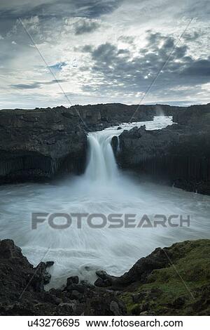 Stock Photography - Aldeyjarfoss summer sunrise. Fotosearch
