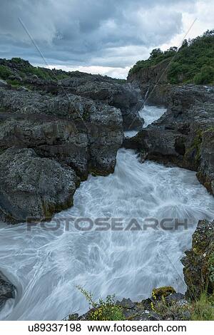 Stock Photo - Barnfoss at sundown. Fotosearch