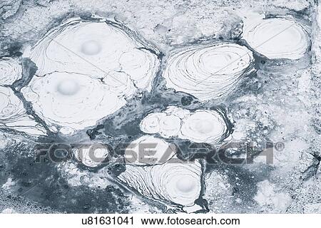 Stock Image - Boiling mud abstract. Fotosearch