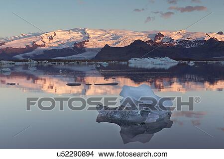 Picture - Iceberg at sunrise. Fotosearch