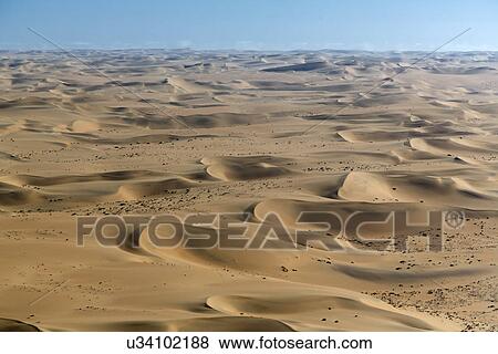 Aerial view of sand dunes, Namib Desert, Namibia View Large Photo Image Stock Photo - Aerial view of sand dunes, Namib Desert, Namibia. Fotosearch