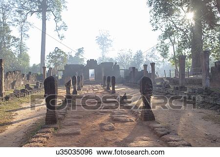 Stock Photograph - Ancient temple at sunrise, Siem Reap, Cambodia. Fotosearch
