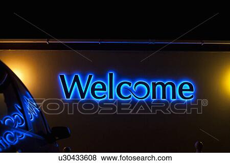 Stock Photo - Blue neon welcome sign. Fotosearch