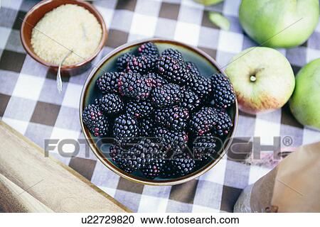 Stock Image - Bowl of fresh blackberries. Fotosearch