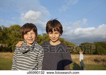 Boys out in the park View Large Photo Image Stock Image - Boys out in the park. Fotosearch
