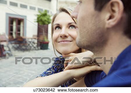 Close up of young romantic couple on street View Large Photo Image Stock Image - Close up of young romantic couple on street. Fotosearch