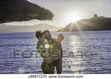 Couple taking selfie on vacation View Large Photo Image Stock Image - Couple taking selfie on vacation. Fotosearch