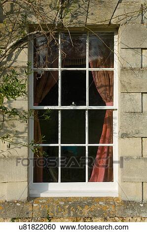 Downstairs window of traditional stone house View Large Photo Image Stock Image - Downstairs window of traditional stone house. Fotosearch