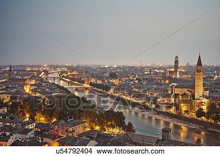 Picture - Elevated view of Verona, Italy, at dusk. Fotosearch