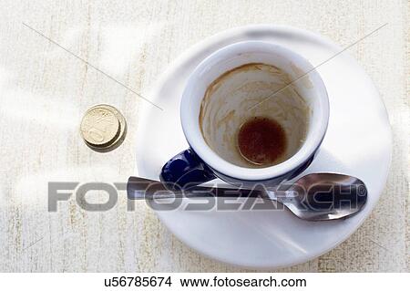 Picture - Empty espresso cup on cafe table. Fotosearch