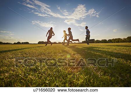 Family out in the park View Large Photo Image Stock Image - Family out in the park. Fotosearch