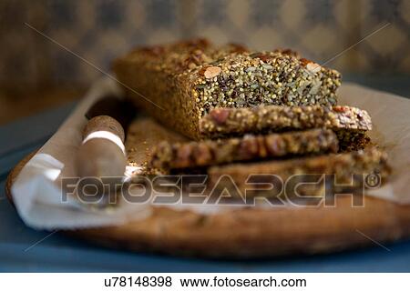 Stock Photo - Gluten free seeded bread on kitchen table. Fotosearch
