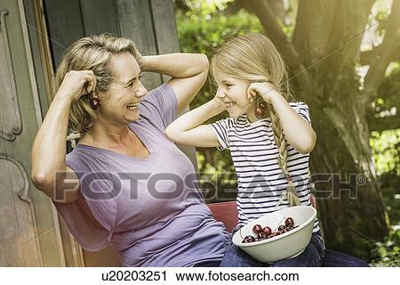Grandmother and granddaughter together View Large Photo Image Stock Image - Grandmother and granddaughter together. Fotosearch