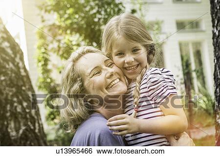 Stock Photograph - Grandmother and granddaughter together. Fotosearch
