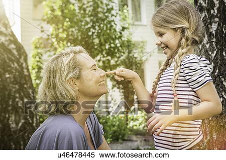 Stock Photography - Grandmother and granddaughter together. Fotosearch