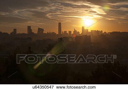 Stock Photo - High angle view of CBD area at sunset, Beijing, China. Fotosearch