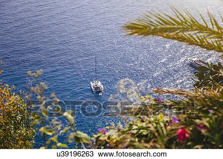 Stock Image - High angle view of sea and boat, Capri, Italy. Fotosearch