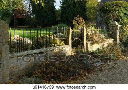 House front garden gate and fence View Large Photo Image Stock Photo - House front garden gate and fence. Fotosearch