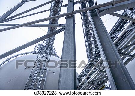 Low angle view of biomass facility View Large Photo Image Stock Photo - Low angle view of biomass facility. Fotosearch