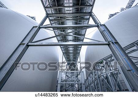 Low angle view of biomass facility View Large Photo Image Stock Photography - Low angle view of biomass facility. Fotosearch