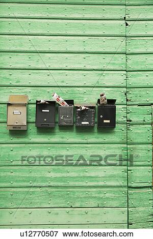 Mail boxes on wooden wall View Large Photo Image Stock Photo - Mail boxes on wooden wall. Fotosearch