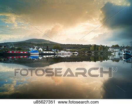 Moored barges at Graiguenamanagh on Barrow Navigation Canal, Ireland View Large Photo Image Stock Image - Moored barges at Graiguenamanagh on Barrow Navigation Canal, Ireland. Fotosearch