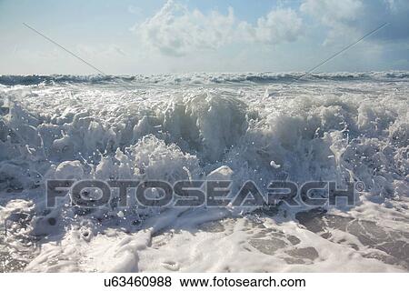 Ocean waves breaking View Large Photo Image Stock Photo - Ocean waves breaking. Fotosearch